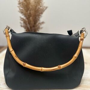 Sophisticated Black Shoulder Bag with Bamboo Accent